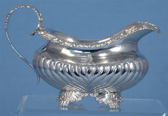 A George III demi fluted silver cream jug, by Joseph Angell I, Length 160mm Weight 7.2oz/225grms